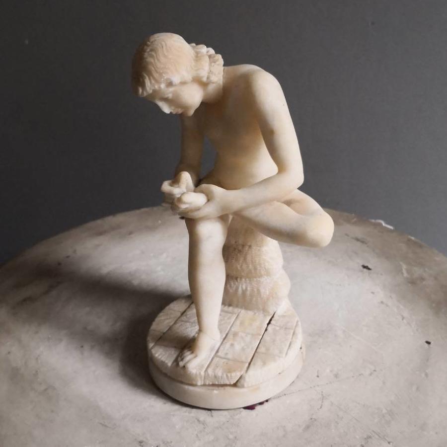 Small alabaster Spinario