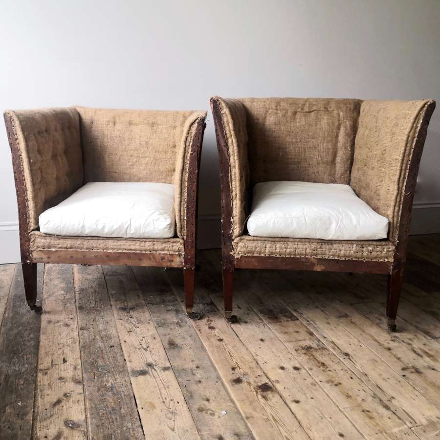 A pair of "his and hers" library chairs