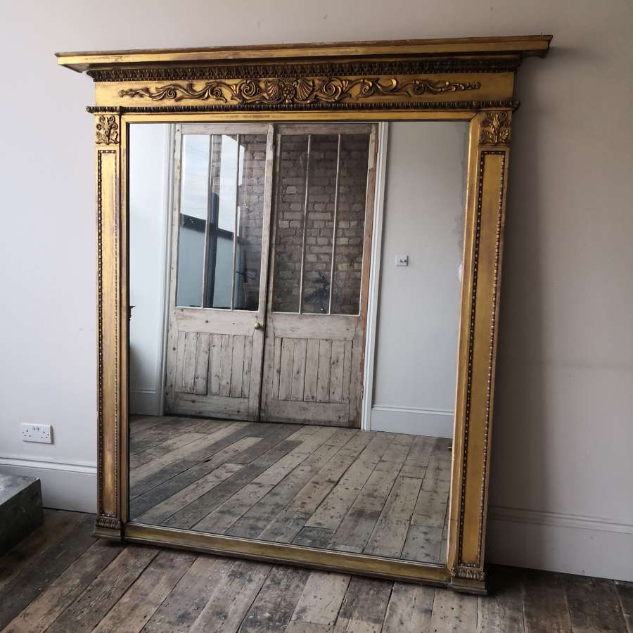 A 19th century gilt over mantle mirror