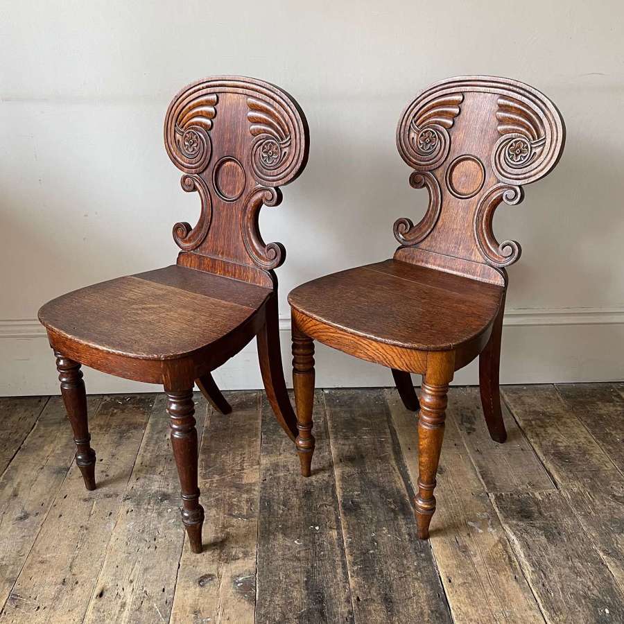 A pair of William IV hall chairs