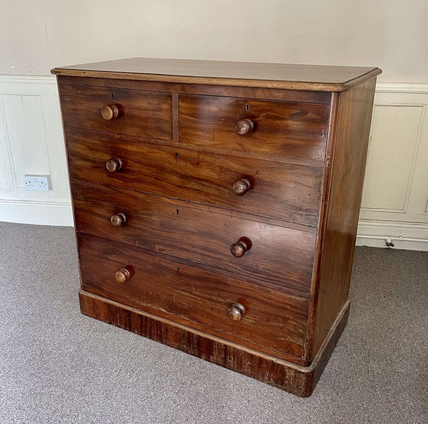 A Heal's and son chest of drawers.