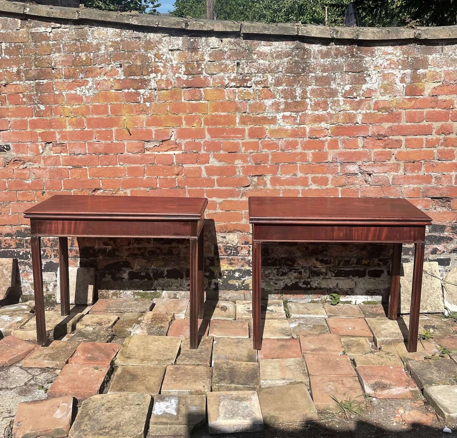 A pair of George III card tables