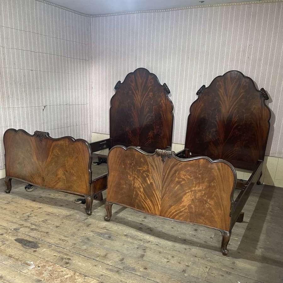 A pair of beds by Howard and Sons