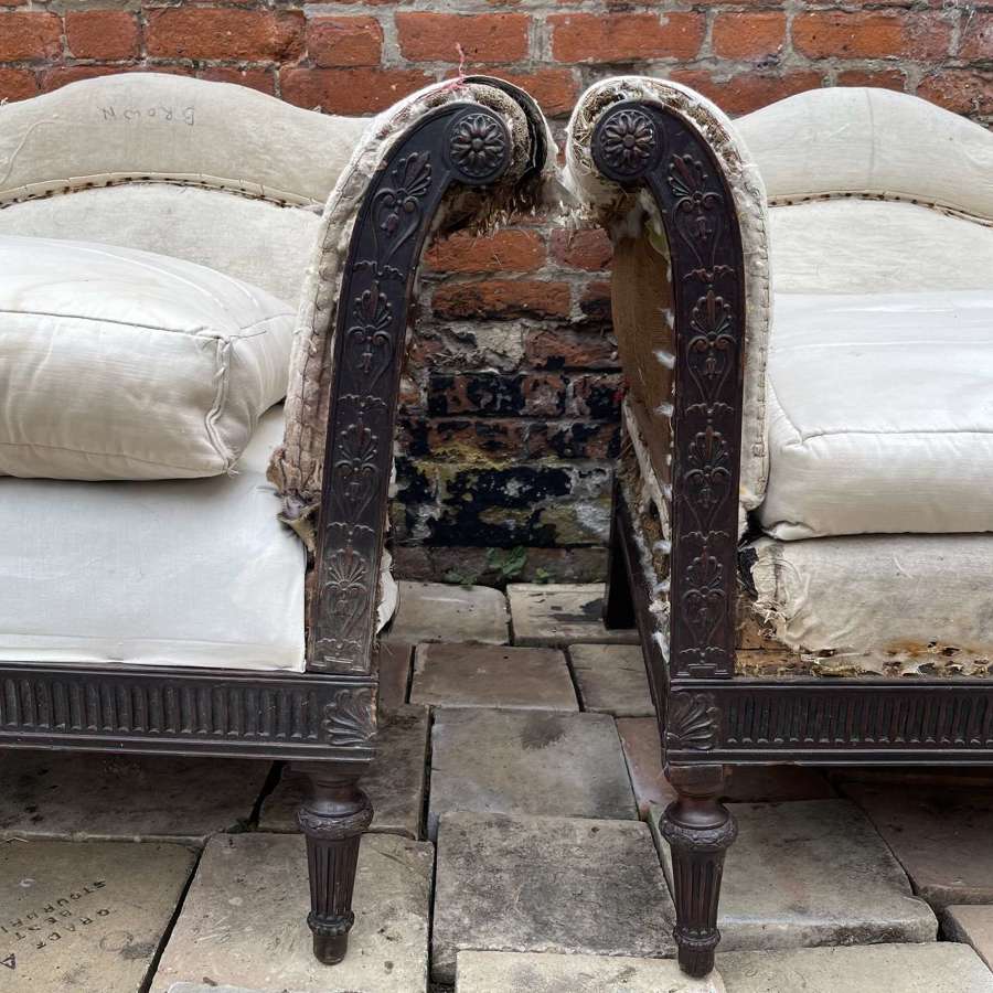 A pair of deep seated 19th century armchairs