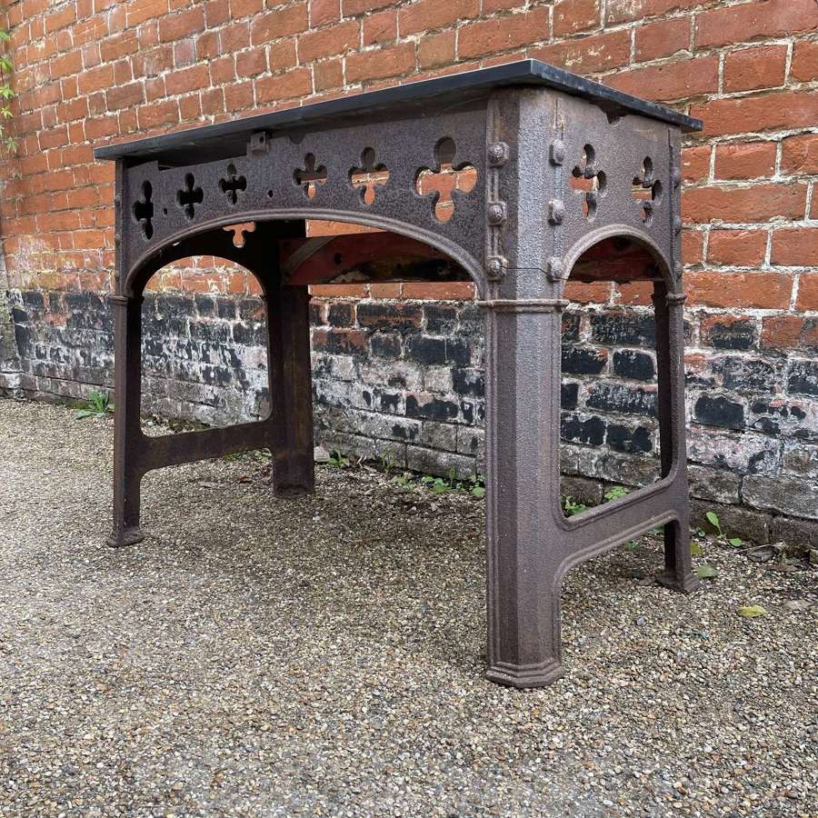 A 19th century cast iron Gothic table