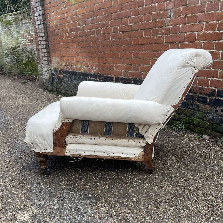 A 19th century club armchair by Holland and sons