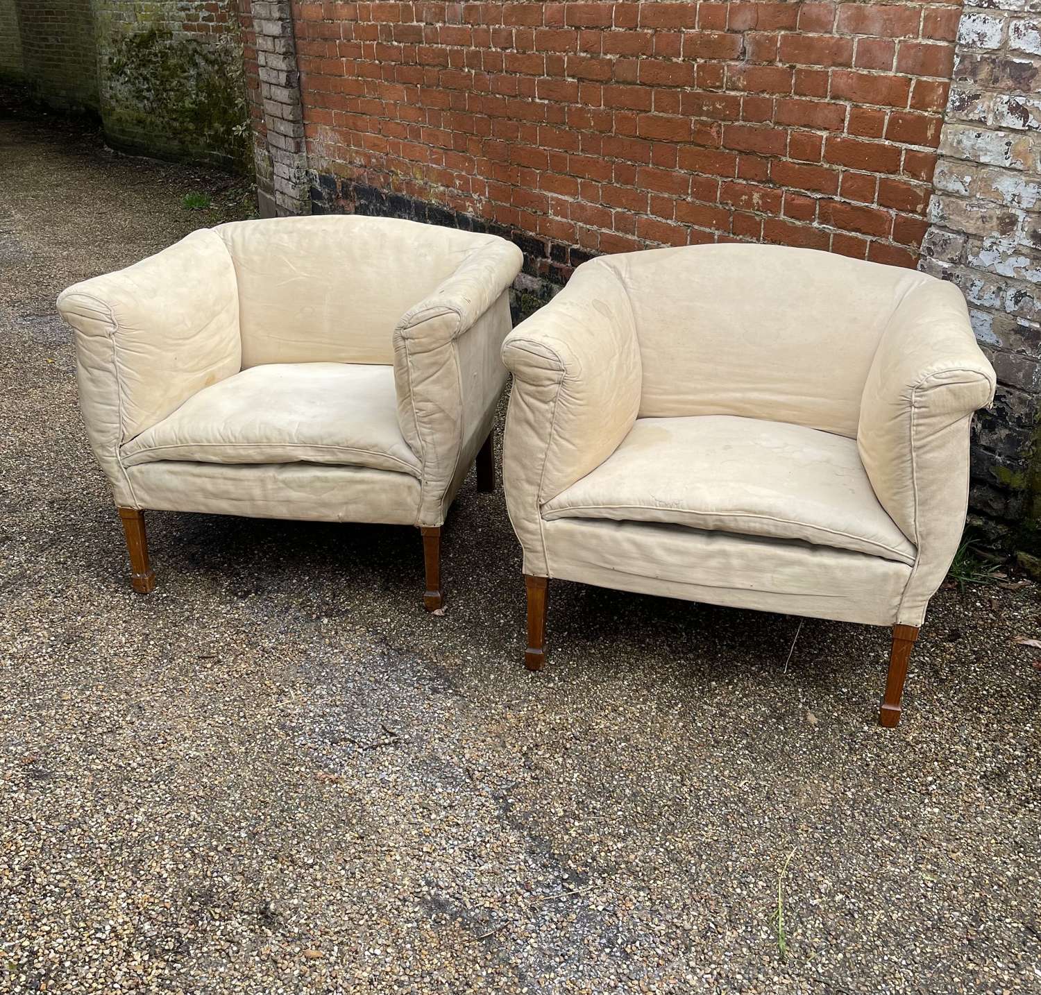 A pair of club chairs