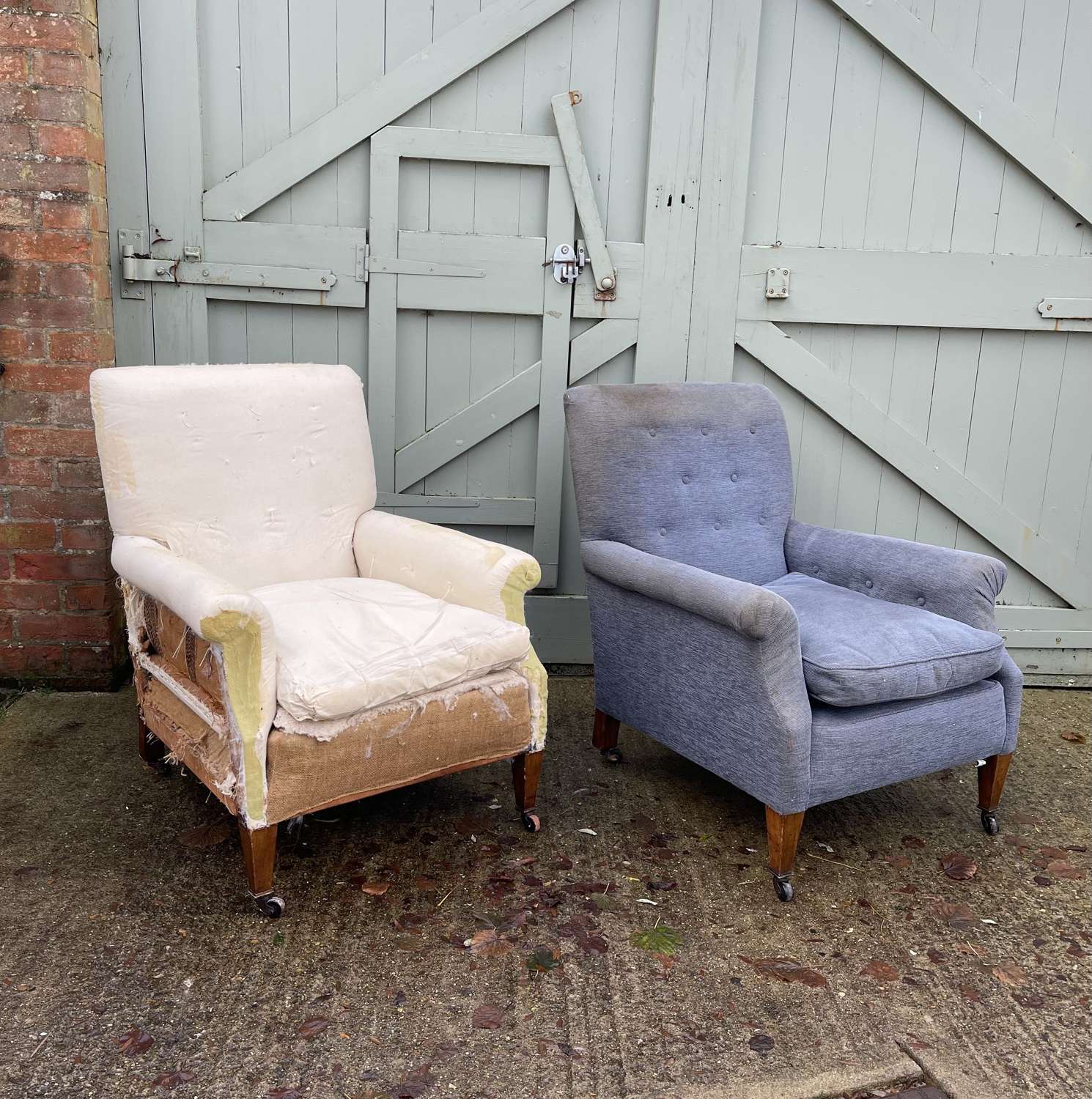 A pair of Edwardian club chairs