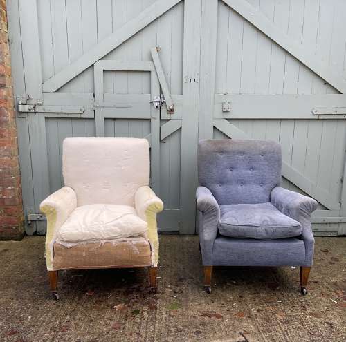 A pair of Edwardian club chairs