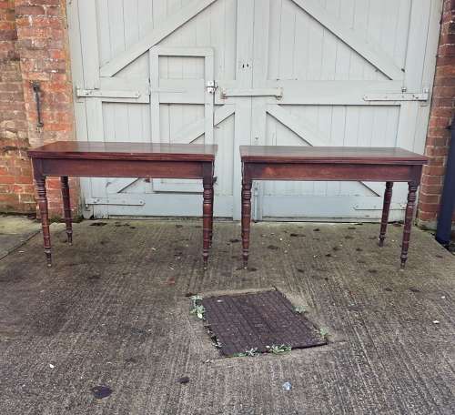 A pair of over scale George III occasional tables