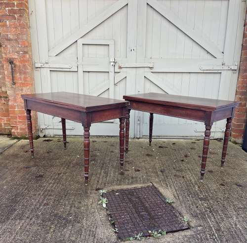 A pair of over scale George III occasional tables