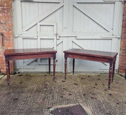 A pair of over scale George III occasional tables