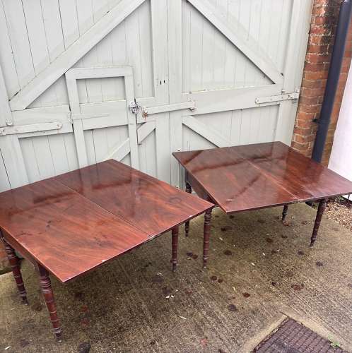 A pair of over scale George III occasional tables