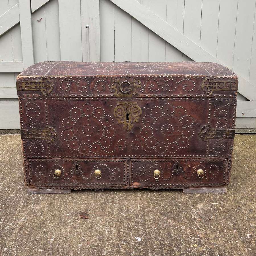 A Queen Anne studded leather trunk