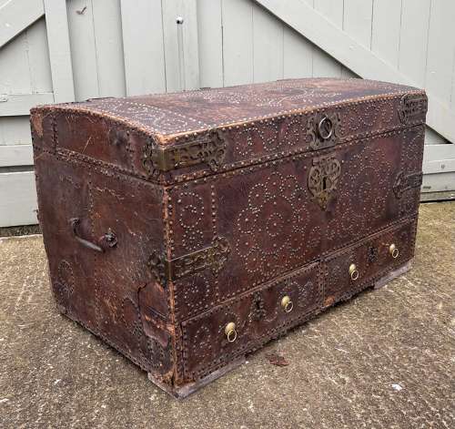 A Queen Anne studded leather trunk