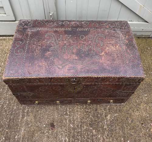 A Queen Anne studded leather trunk