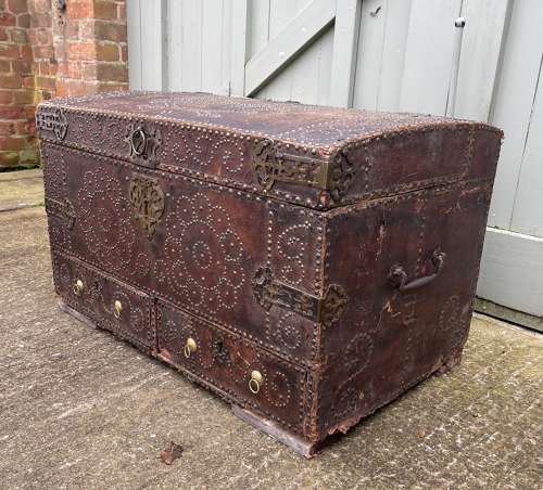 A Queen Anne studded leather trunk