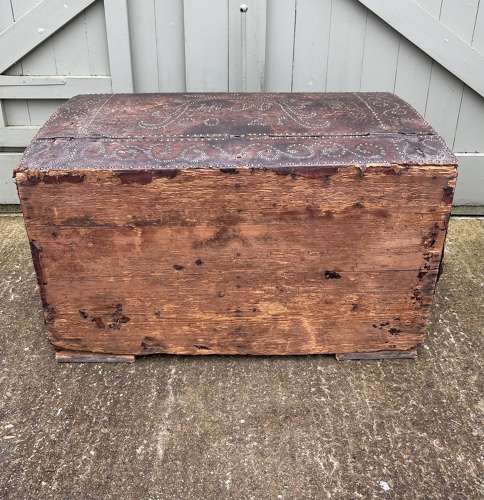 A Queen Anne studded leather trunk