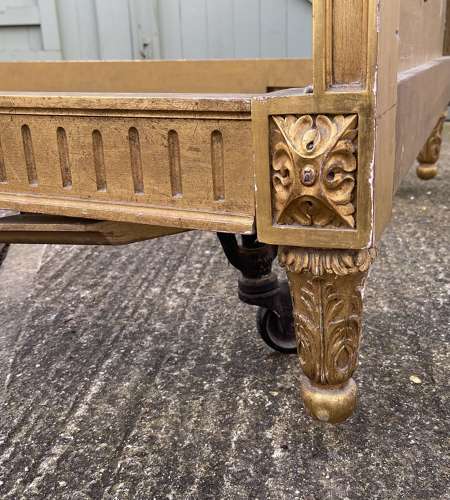 A pair of 19th century gilt wood beds