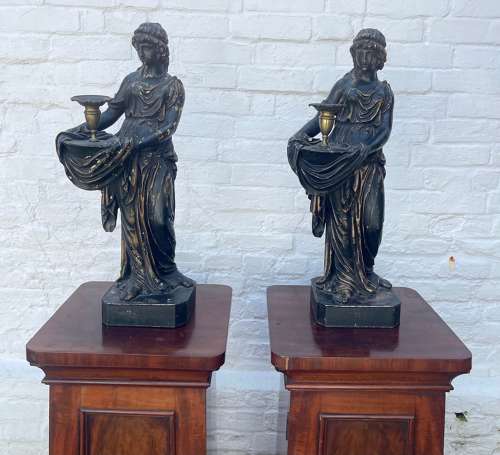 A pair of Regency, figural, plaster candelabra