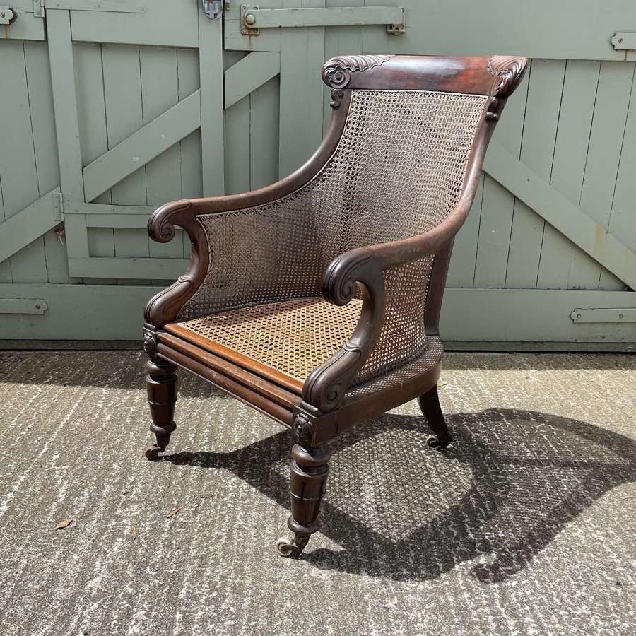 A late Regency bergere chair