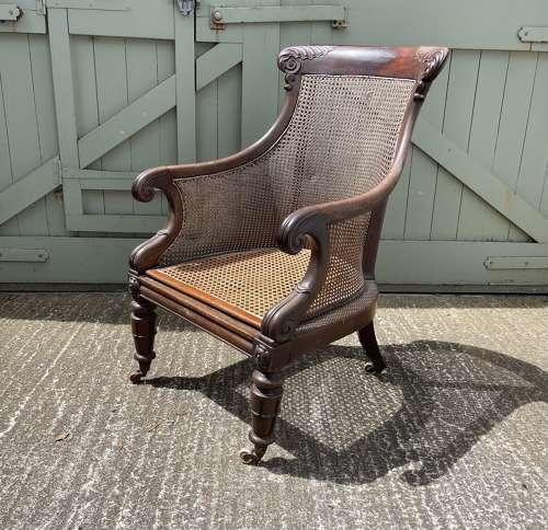 A late Regency bergere chair