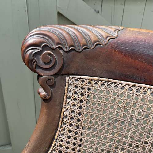 A late Regency bergere chair