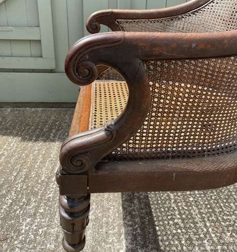 A late Regency bergere chair