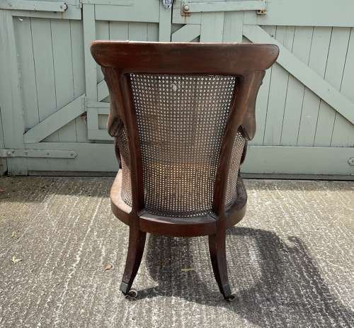 A late Regency bergere chair