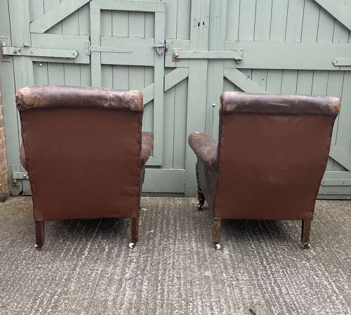 A pair of 19th century leather club chairs
