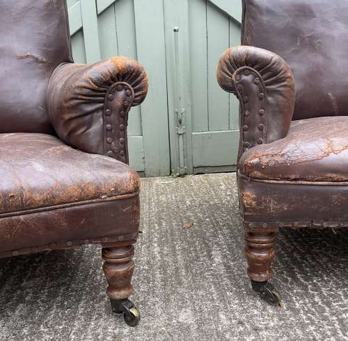 A pair of 19th century leather club chairs