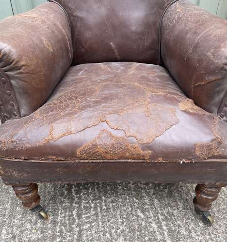 A pair of 19th century leather club chairs