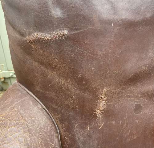 A pair of 19th century leather club chairs
