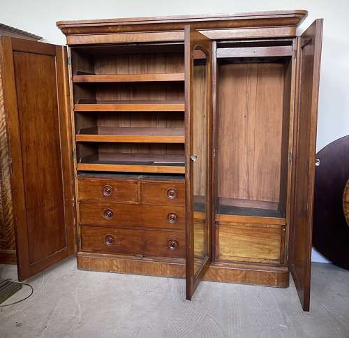 A 19th century satin birch wardrobe
