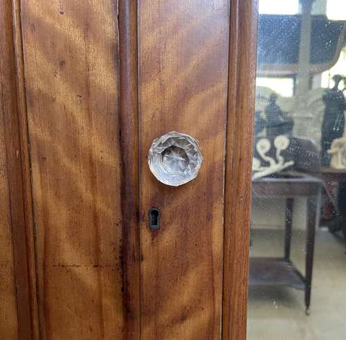 A 19th century satin birch wardrobe