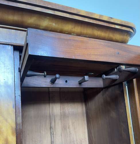 A 19th century satin birch wardrobe