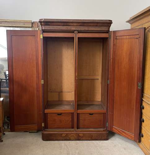 A 19th century simulated bur walnut wardrobe