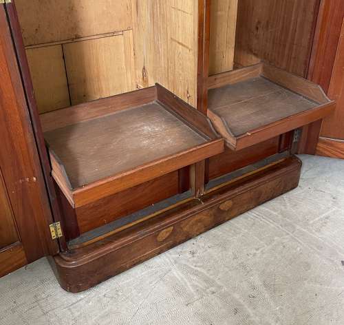 A 19th century simulated bur walnut wardrobe