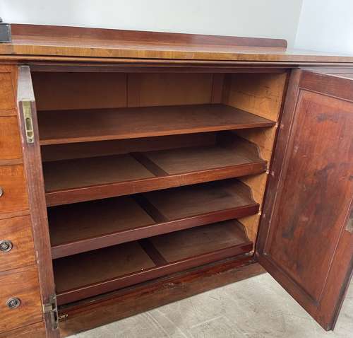 A 19th century press cupboard by Holland and sons