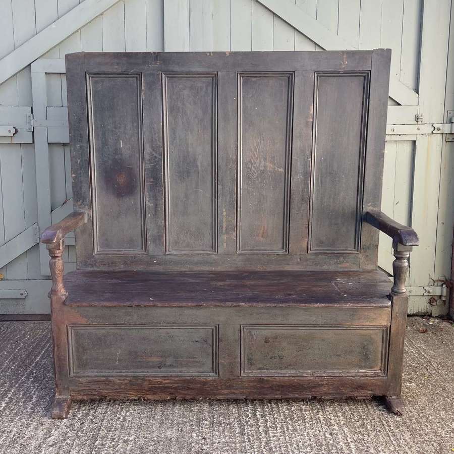 An early 19th century painted tavern settle