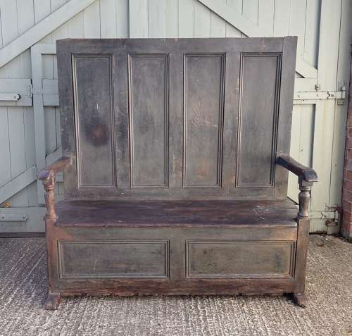 An early 19th century painted tavern settle