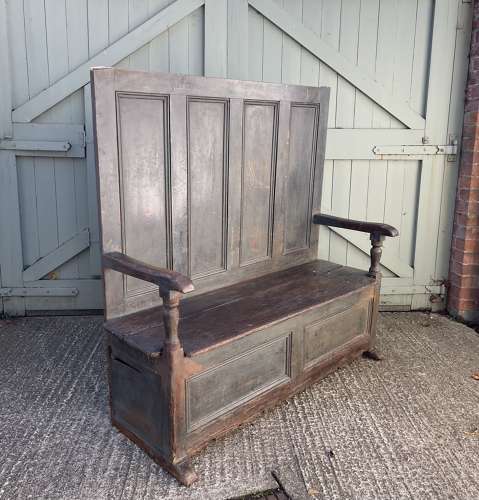 An early 19th century painted tavern settle