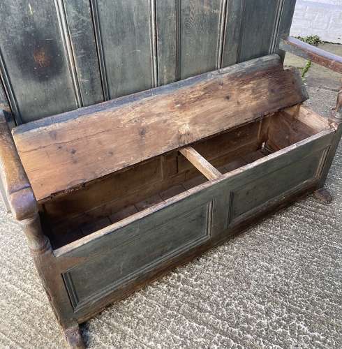 An early 19th century painted tavern settle