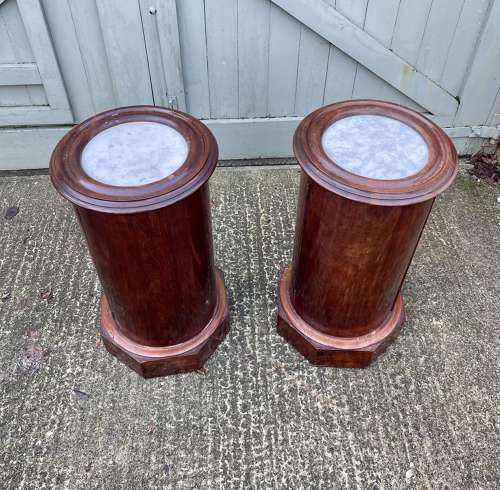 A pair of 19th century cylindrical bedside cupboards