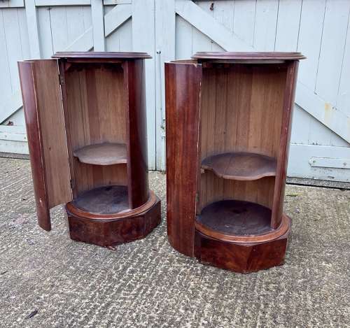A pair of 19th century cylindrical bedside cupboards