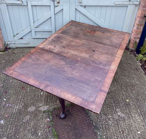 An 18th century drop leaf table