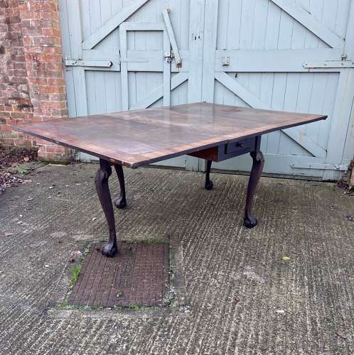 An 18th century drop leaf table
