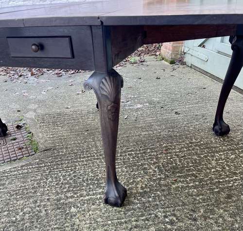 An 18th century drop leaf table