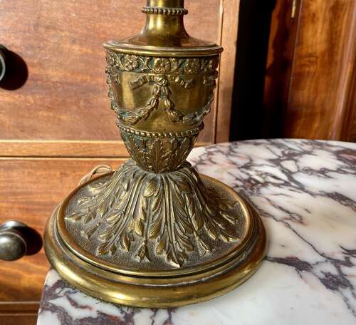 A pair of gilt metal lamps
