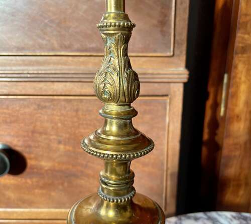 A pair of gilt metal lamps